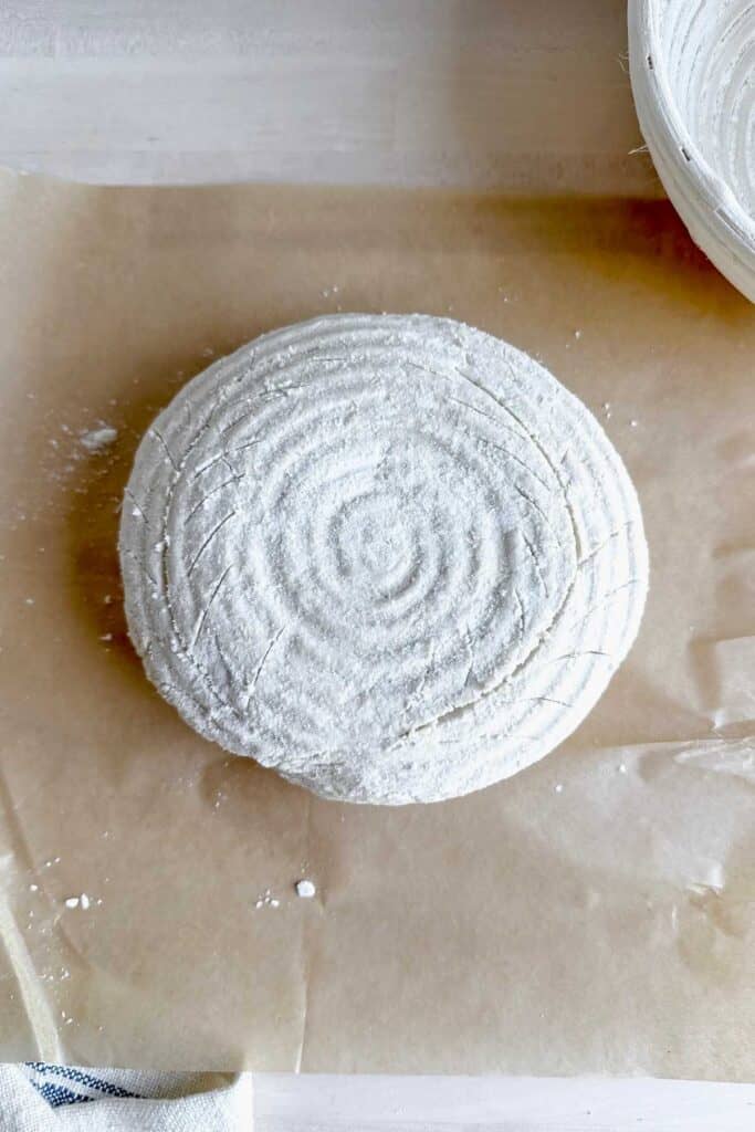 a scored design in the top of the gf sourdough bread