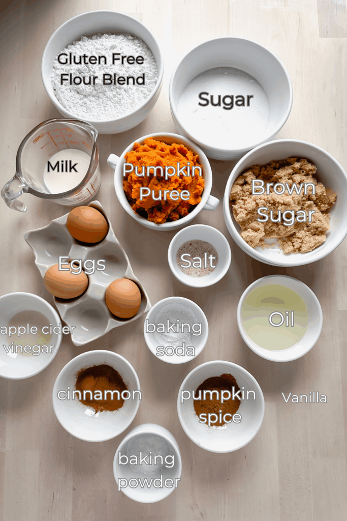 many little white bowls on counter with ingredients in them