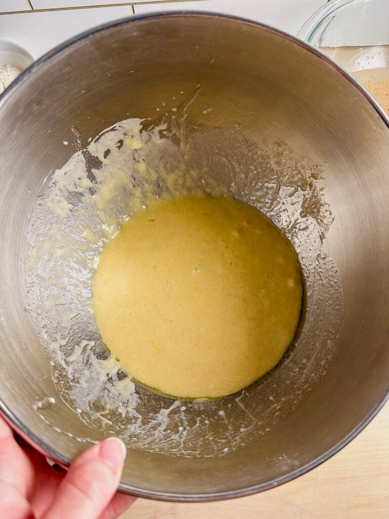 stand mixing bowl with wet ingredients whisked together