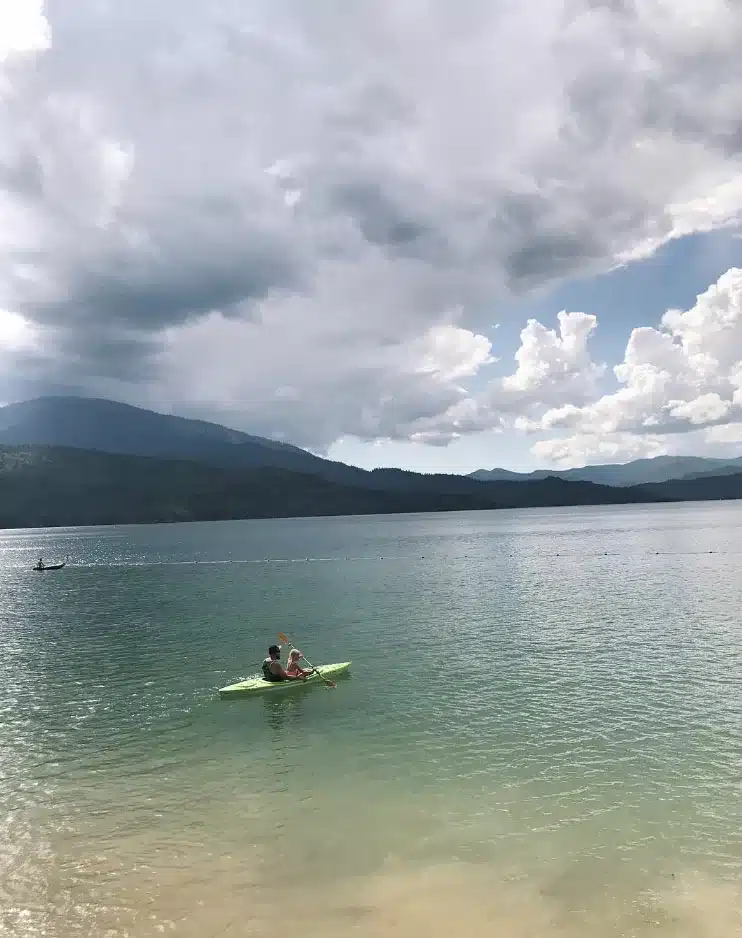 father and daughter kayaking in whiskey town lake