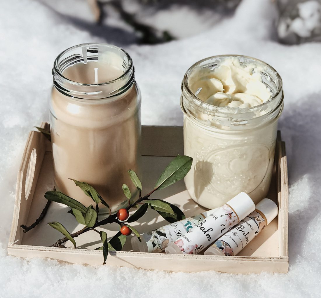 home made candle hand lotion lip balm on try in snow