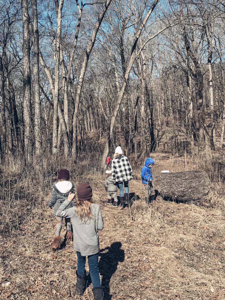 children exploring nature outdoors with our co op