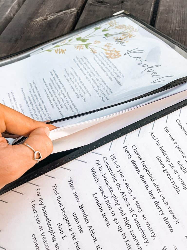 hymn lyrics stacked inside of morning menus