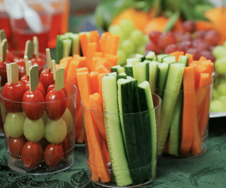 variety of vegetables cut up into serving cups