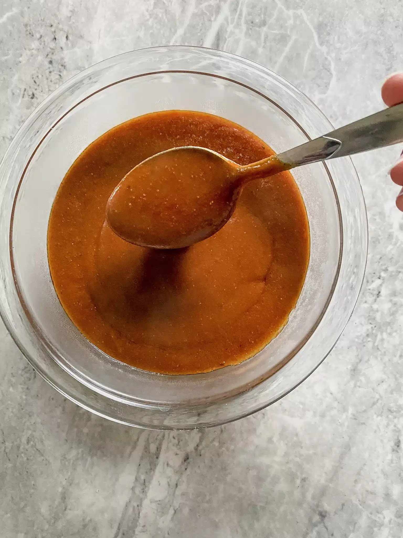 bowl of homemade gluten free enchilada sauce red