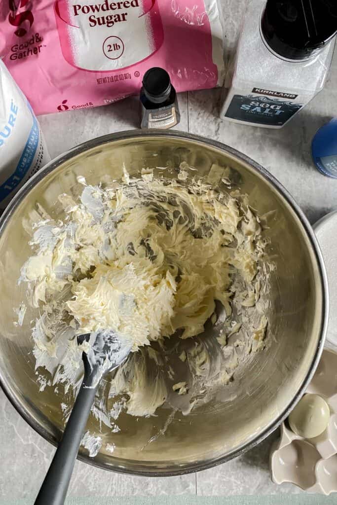 cream butter and cream cheese till smooth