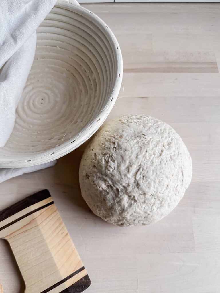 banneton basket with gf dough on countertop