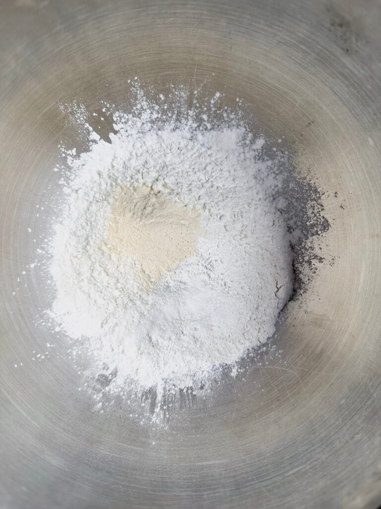 large mixing bowl with dry ingredients in it