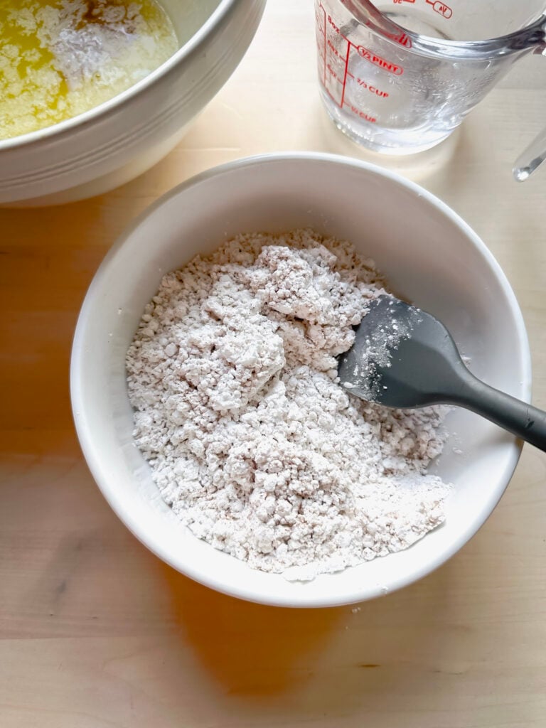 whisking the pumpkin spice into the powdered sugar