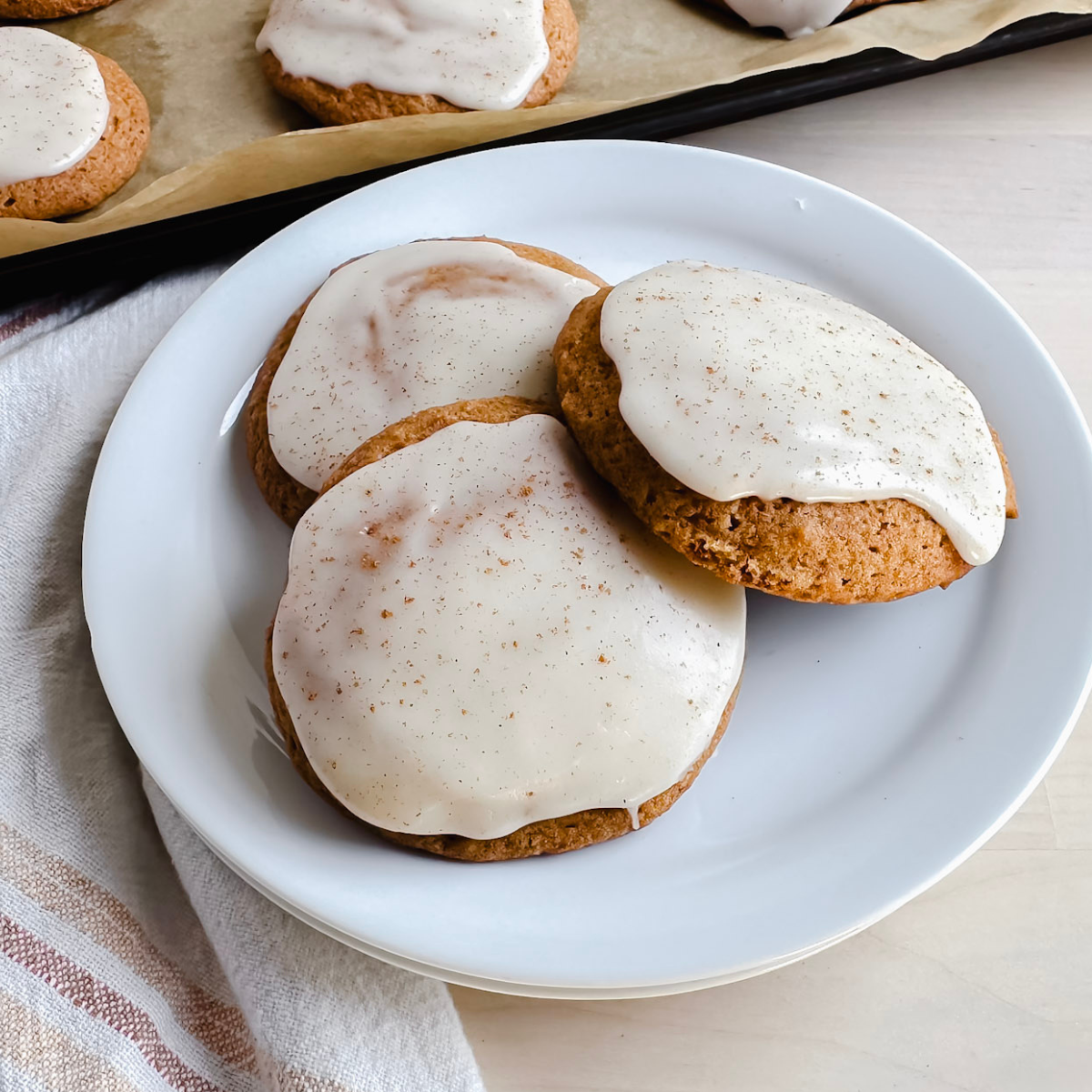 white plate with three pumpkin spice gluten free cookies