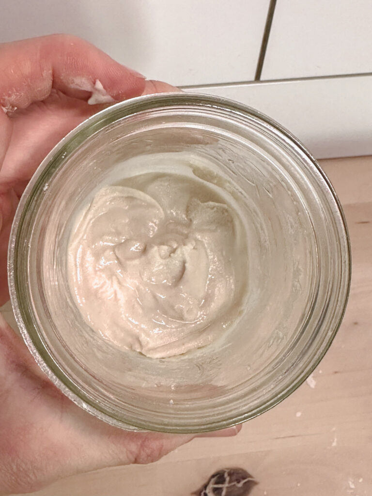 glass mason jar with a smooth mixture of gluten free rice flour and water