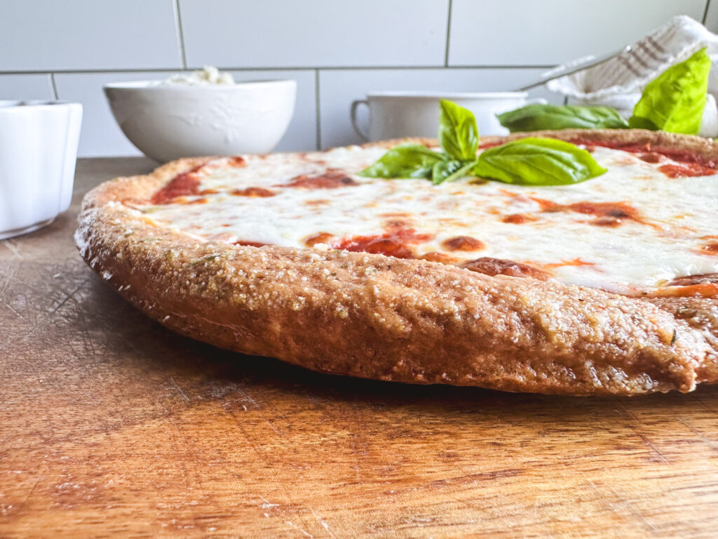 gluten free pizza crust texture shot showing the garlic parmesan crust